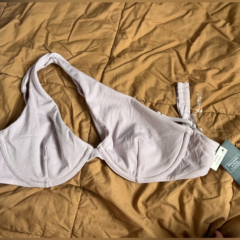 light sparkly Abercrombie purple curve love bikini top. New with tags size s